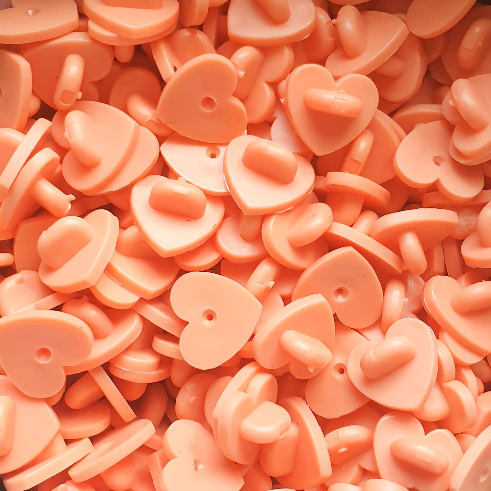 Orange Heart Shape Rubber Pin Backs 4pc.
