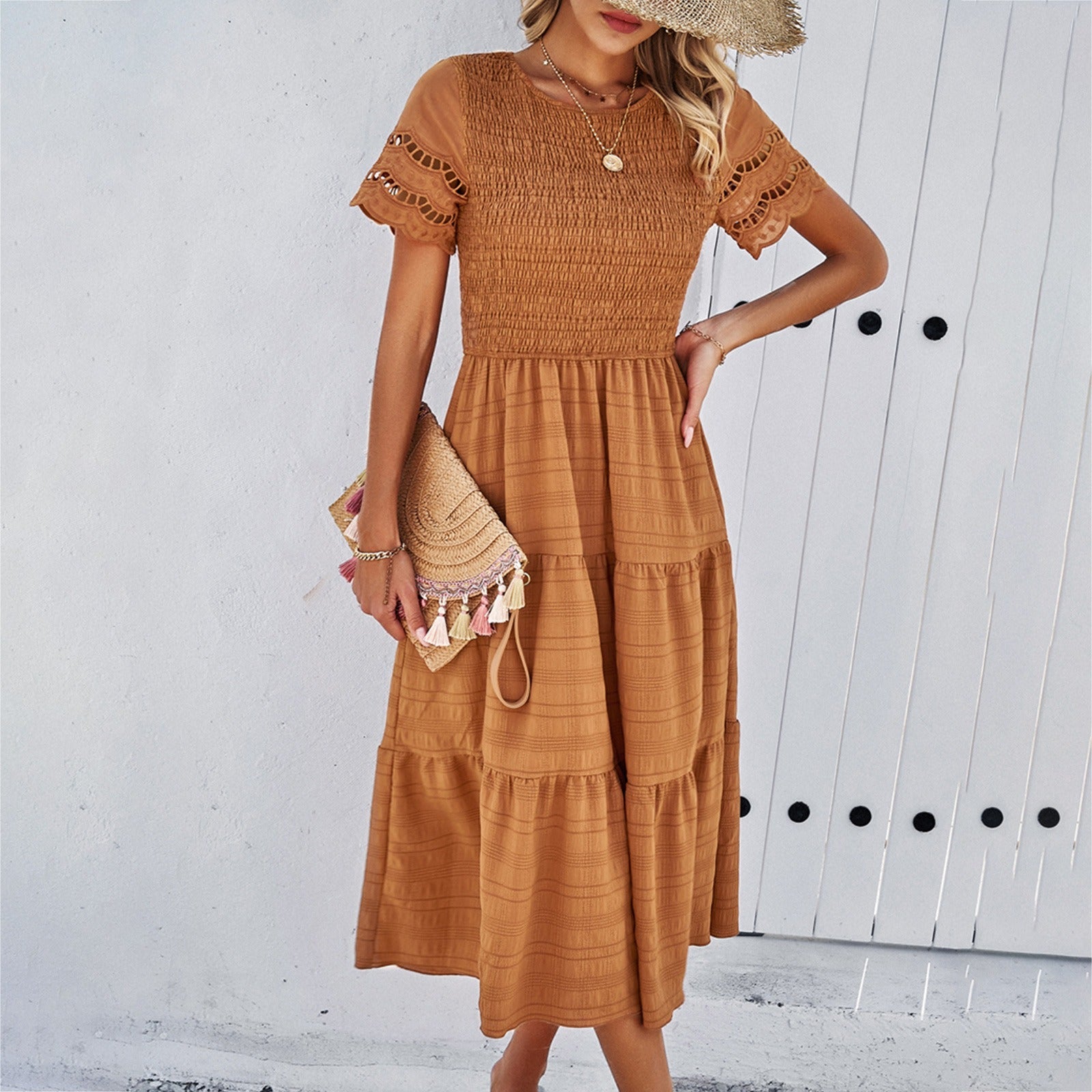 Spring and summer solid color temperament with a pleated hollow dress
